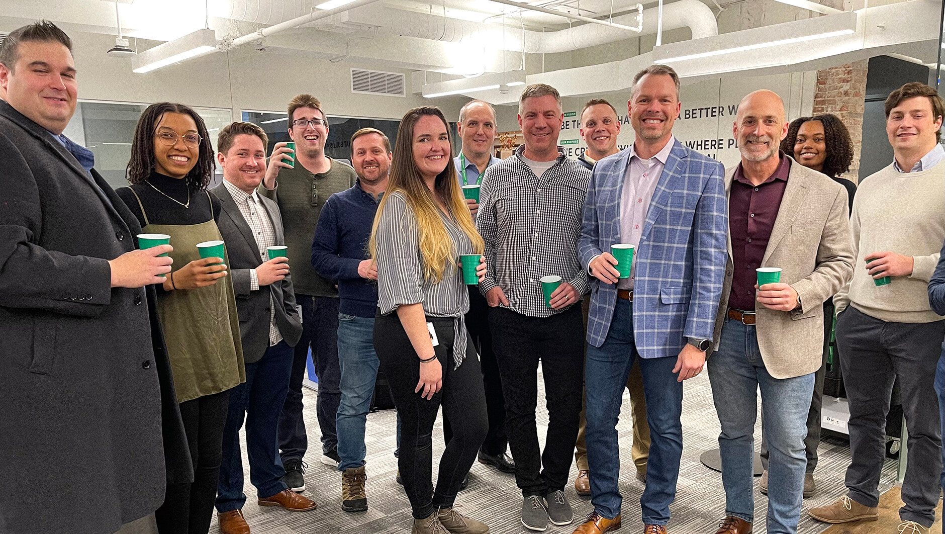 A group of employees and clients posing for a photo in our Philadelphia office.