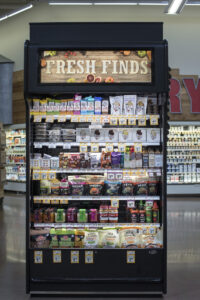 The Fresh Finds section of a Sprouts Farmers Market filled with products.