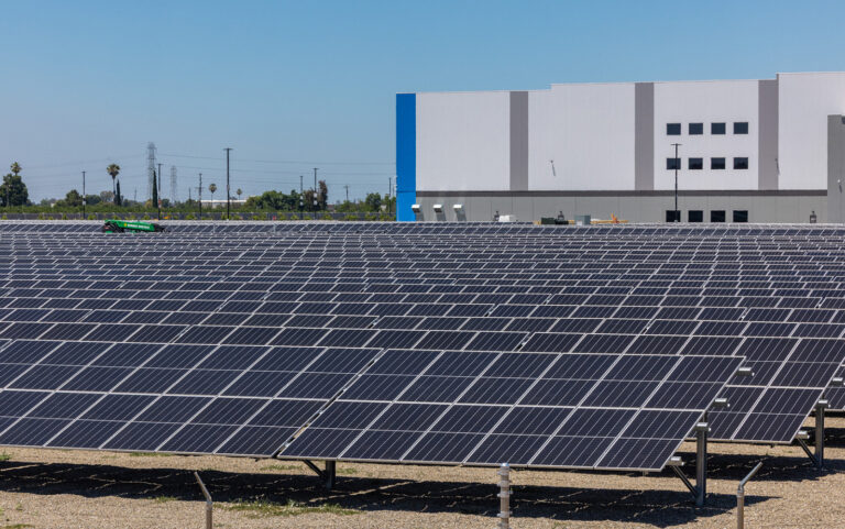 Solar panels help power a warehouse facility for a national retailer.