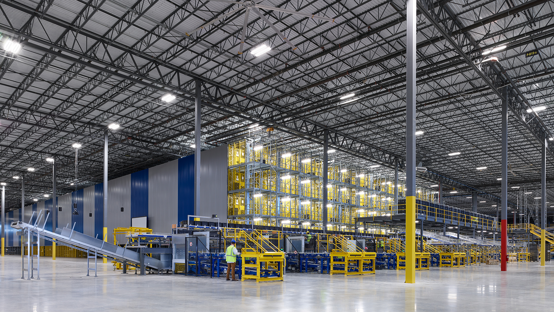 Interior of a shipping section in a large warehouse.